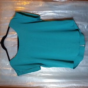 LESTER Green short sleeve top.